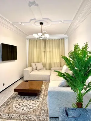 a living room with a couch and a table at Luxury House in Rabat in Rabat