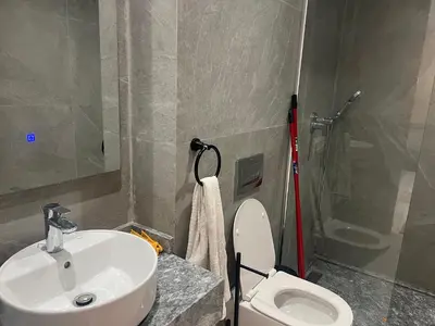 a bathroom with a sink and a toilet and a shower at Casablanca Luxe studio in Casablanca