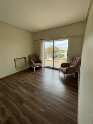 a waiting room with two chairs and a large window at Villa Prestige avec piscine in Tamaris