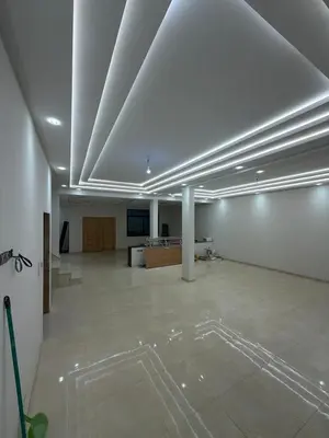 a large room with white walls and a white ceiling at Saad's villa in Mohammedia