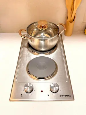 a pot sitting on top of a stove at Cozy & Well-Equiped Studio - Valfleuri in Casablanca