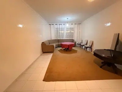a living room with a couch and a table at Appartement avec vue sur monument emblématique Hassan II in Casablanca