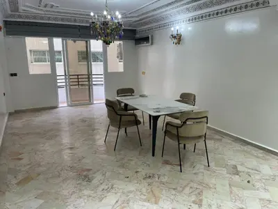 a dining room with a table and chairs at Casablanca Happy B&B in Casablanca