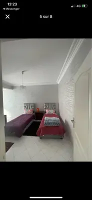 a bedroom with two beds in a room at Amir 11 A in Casablanca