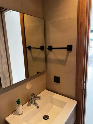 a bathroom with a sink and a mirror at Studio 14 in Casablanca
