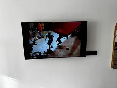 a flat screen tv hanging on a wall at Studio 14 in Casablanca