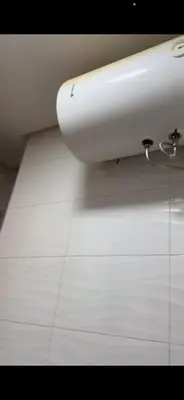 a close up of a white toilet in a bathroom at Appartement journalier in Rabat