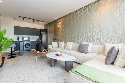 a living room with a couch and a table at Cosy Netflix & Amazing Sunset View in Casablanca