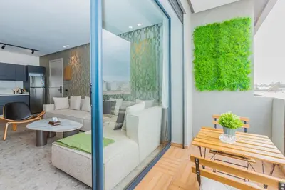 a living room with a couch and a table at Cosy Netflix & Amazing Sunset View in Casablanca