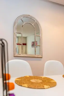 a table with a plate on a table with a mirror at Central Studio CFC I Gym I Pool in Casablanca