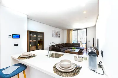 a kitchen with a sink and a counter top at Cosy Flat for Business Trip at CFC - Infinity Pool in Casablanca