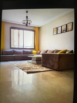 a living room with a couch and a window at Taj collection 1 in Casablanca