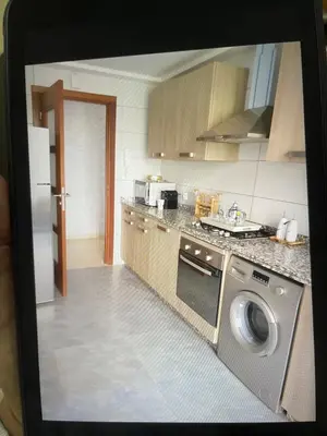 a kitchen with a stove and a dishwasher at Taj collection 1 in Casablanca