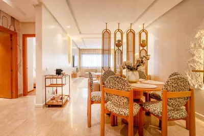 a dining room with a table and chairs at Luxurious 2BR 2BA For Families and groups in Casablanca