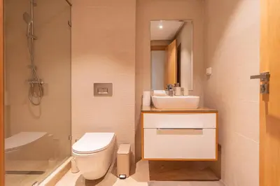a bathroom with a toilet and a sink and a shower at Luxurious 2BR 2BA For Families and groups in Casablanca