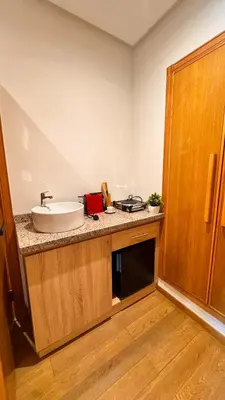 a bathroom with a sink and a counter top at Panoramic sea view high speed wi-fi central in Casablanca