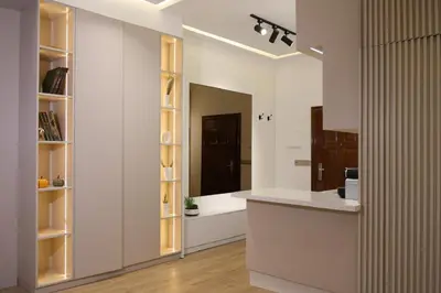 a kitchen with white cabinets and a counter top at Premium Studio near Agdal Train Station in Rabat