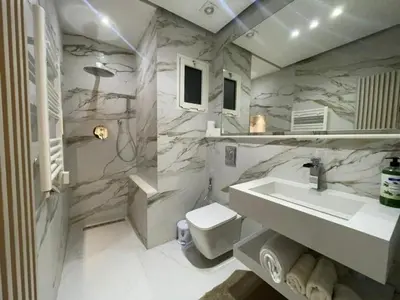 a bathroom with a sink and a toilet at Premium Studio near Agdal Train Station in Rabat