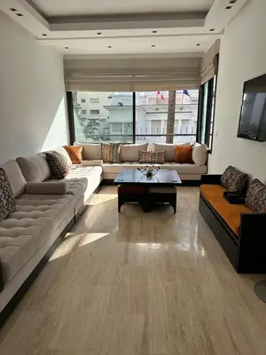 a living room with a couch and a table at 9 Rue d'Alger Casablanca in Casablanca