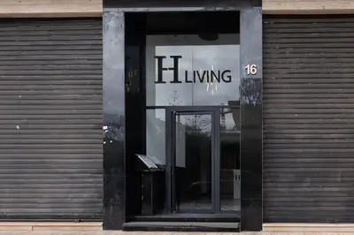 a glass door of a building with a living sign on it at Studio Joudia in Casablanca