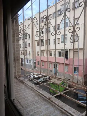 a view of a building from a window at Cambre à louer in Casablanca