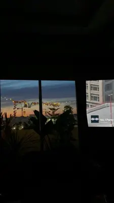 a window with a view of a city skyline at Modern Chic Studio avec Terrace privée et Vue Sans Vis-a-vis et Parking privé in Casablanca