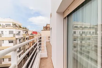 a balcony with a view of a city at Confort Urbain - Plein centre & Spacieux in Casablanca