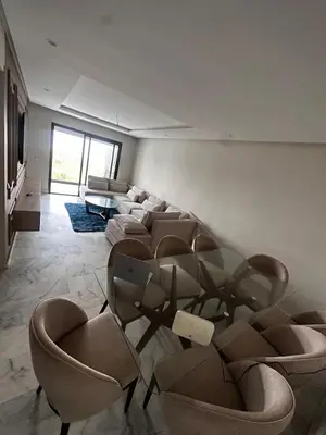a room with couches and chairs in a room at appartement de luxe a Mansouria in Mansouria