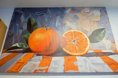 a painting of an orange and an orange slice at Modern CFC Flat with Terrace Gym & City Views in Casablanca