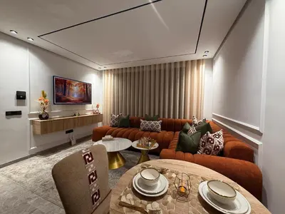 a living room with a couch and a table at Apparently city center in Casablanca