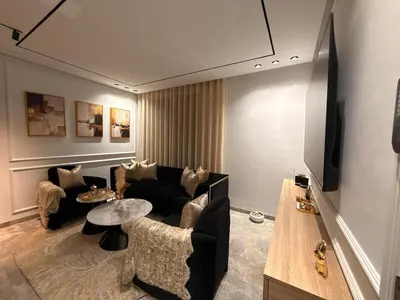 a living room with a couch and a table at Jolie studio plein centre Casablanca in Casablanca