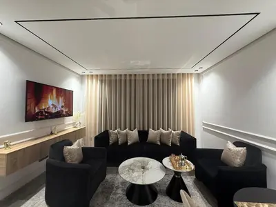 a living room with a couch and a table at Jolie studio plein centre Casablanca in Casablanca