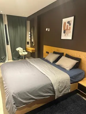 a bedroom with a large bed in a room at Élégant & Spacieux - Résidence Sécurisée à Témara in Temara