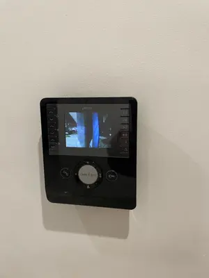 a black object is hanging on a wall at Private Room,Piscine & Parking en cohabitation avec le hôte seulement à 6 min Airport MohamedV in Nouaceur