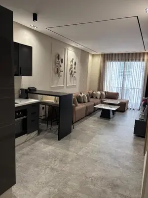 a living room with a couch and a table at Bridge Collection - Mirage in Casablanca