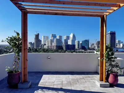 a patio with a view of the city at anfa park residence beau living park in Casablanca
