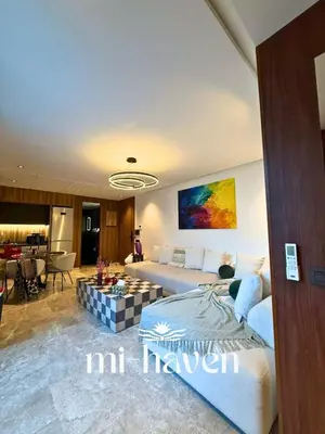 a large room with a bed and a living room at Happy - 2 BR - Downtown Casablanca in Casablanca