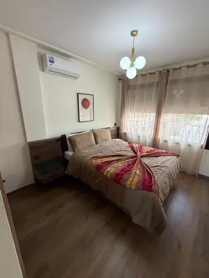 a bedroom with a large bed in a room at Cozy studio for rent for respectful family couple in Casablanca