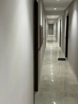 a hallway of a building with a long corridor at Cozy studio for rent for respectful family couple in Casablanca