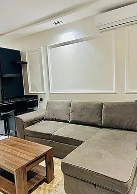a living room with a couch and a table at Located at Building 55, Golden Pavilion, 3rd Floor in Casablanca