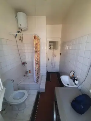 a bathroom with a toilet and a sink and a tub at Cozy Studio with Balcony, Casa Center Close to Everything in Casablanca