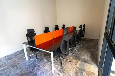 a conference room with a long table and chairs at Appartement moderne avec parking, toit terrasse et salle de sport - Anfa Park in Casablanca