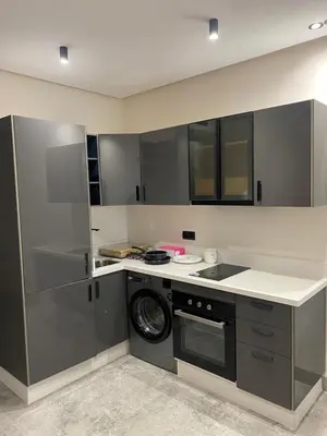 a kitchen with a washing machine and a washer at CFC centre d'affaires - Salle de sport - Wifi in Casablanca
