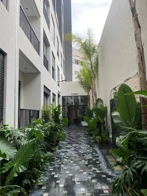 a stone walkway in the middle of a building at CFC centre d'affaires - Salle de sport - Wifi in Casablanca