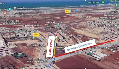 a map of a city with a red arrow at 2 Bedrooms 3 beds and a living room in Dar Bouazza in Dar Ben Abdallah Ben Dehbi
