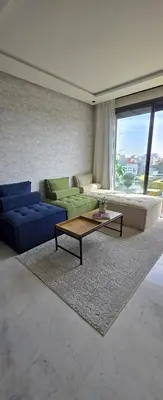 a living room with a couch and a coffee table at New And Bright Terrace Panoramic View in Casablanca