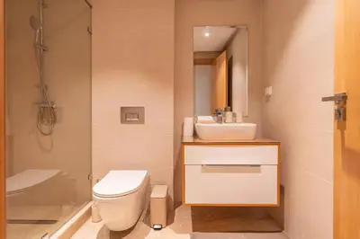 a bathroom with a toilet and a sink and a shower at LuxArt Casablanca in Casablanca