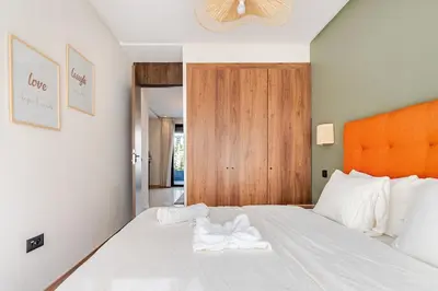 a bedroom with a bed with two towels on it at Centrale studio with Nice terasse in Maarif