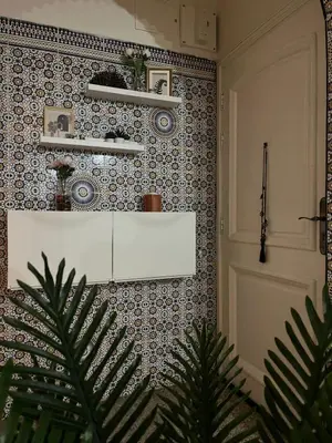 a room with a white cabinet on a wall with tiles at Chambre Cosy - Accès Côte et Plage Mohammedia, Centre-Ville Mohammedia à Pied - Résidence 3 Mars in Mohammedia