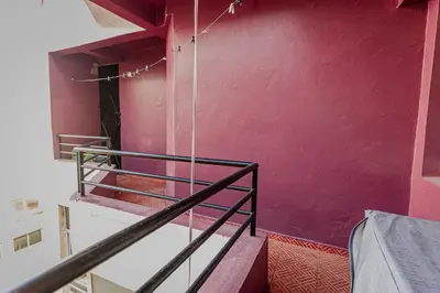 a red room with stairs and a red wall at Apartement complets pres Ocean port de Casablanca in Casablanca